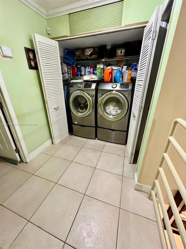 14362 SW 96th Ln, Miami, FL 33186 - laundry room featuring crown molding, light tile patterned flooring, separate washer and dryer, and baseboards