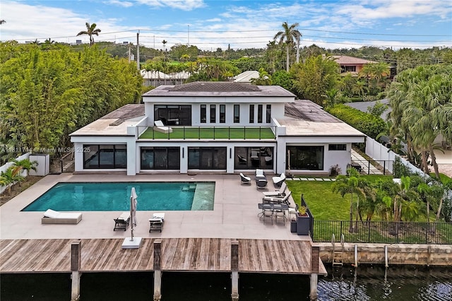 1601 Diplomat Pkwy, Hollywood, FL 33019 - rear view of house featuring a patio area and a balcony