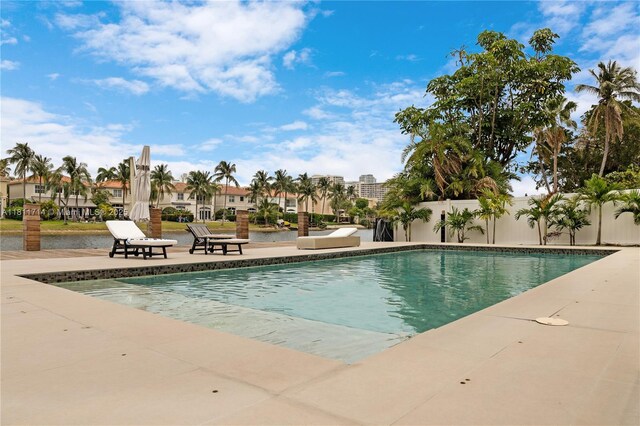 1601 Diplomat Pkwy, Hollywood, FL 33019 - swimming pool with a patio and a residential view