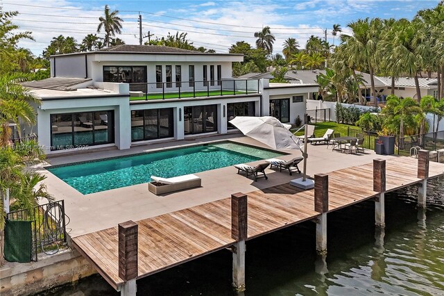 1601 Diplomat Pkwy, Hollywood, FL 33019 - view of swimming pool featuring a patio area and a water view