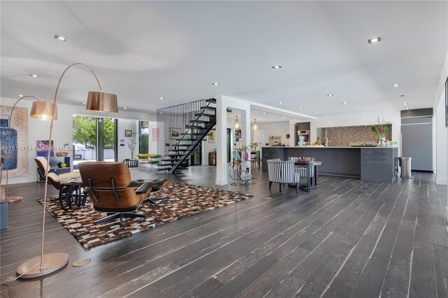 1601 Diplomat Pkwy, Hollywood, FL 33019 - living area with wood finished floors, stairway, and recessed lighting