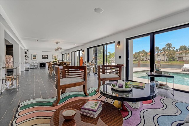 1601 Diplomat Pkwy, Hollywood, FL 33019 - dining area featuring wood finished floors and a water view