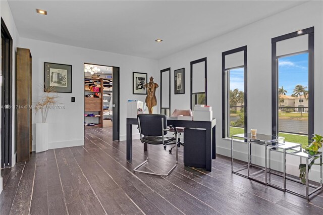 1601 Diplomat Pkwy, Hollywood, FL 33019 - office with healthy amount of natural light, dark wood-style flooring, recessed lighting, and baseboards