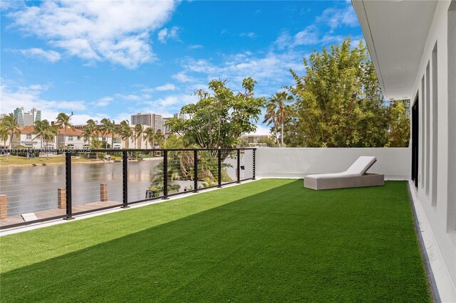 1601 Diplomat Pkwy, Hollywood, FL 33019 - view of grassy yard featuring a water view and a balcony