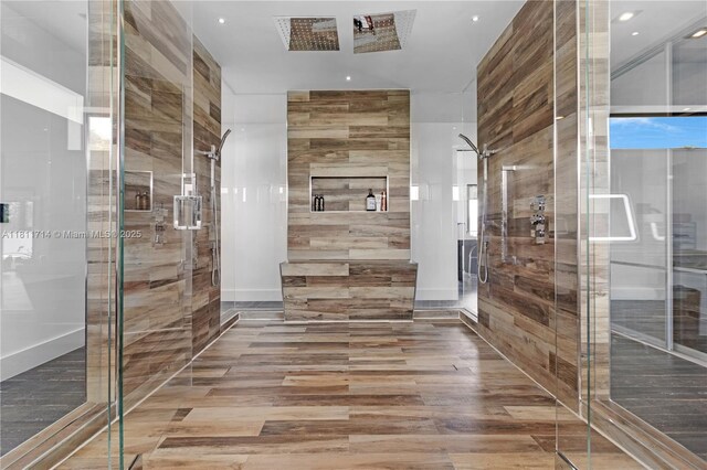 1601 Diplomat Pkwy, Hollywood, FL 33019 - bathroom featuring a stall shower and wood finished floors