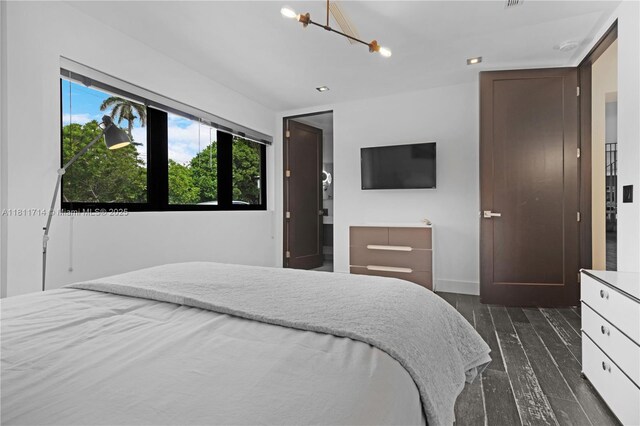 1601 Diplomat Pkwy, Hollywood, FL 33019 - bedroom with dark wood-type flooring and baseboards