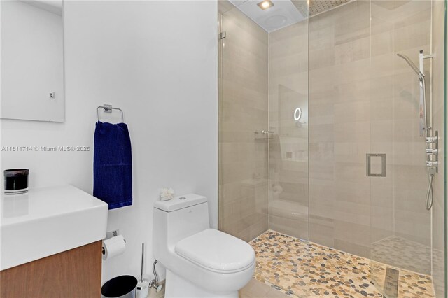 1601 Diplomat Pkwy, Hollywood, FL 33019 - full bathroom with vanity, a shower stall, and toilet