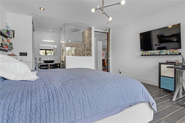1601 Diplomat Pkwy, Hollywood, FL 33019 - bedroom with a chandelier and wood finished floors