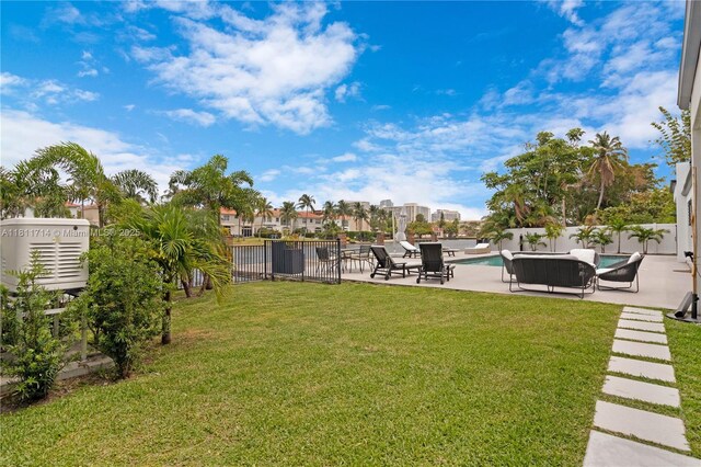 1601 Diplomat Pkwy, Hollywood, FL 33019 - view of yard with a patio area and an outdoor hangout area