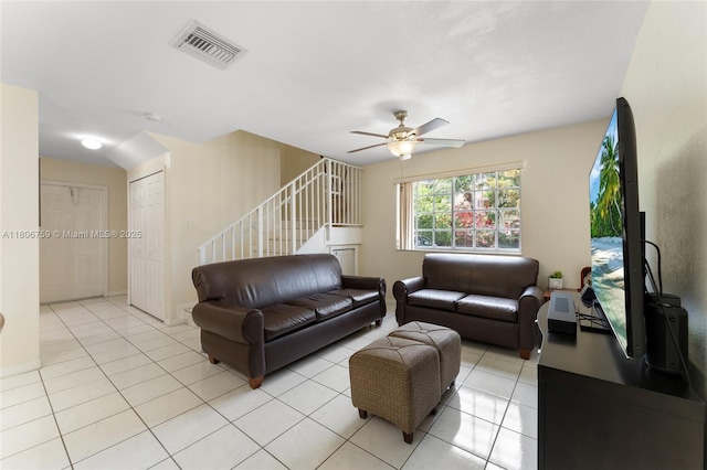 6755 NW 182nd St Unit 104, Hialeah, FL 33015 - living area with a ceiling fan, stairway, and light tile patterned floors