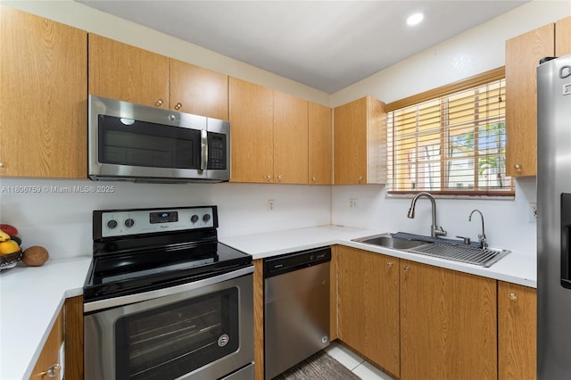 6755 NW 182nd St Unit 104, Hialeah, FL 33015 - kitchen with appliances with stainless steel finishes, a sink, and light countertops