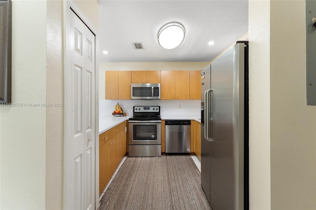 6755 NW 182nd St Unit 104, Hialeah, FL 33015 - kitchen with stainless steel appliances and light countertops