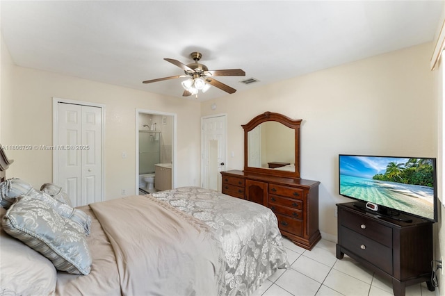 6755 NW 182nd St Unit 104, Hialeah, FL 33015 - bedroom featuring light tile patterned floors, a closet, ceiling fan, and ensuite bathroom