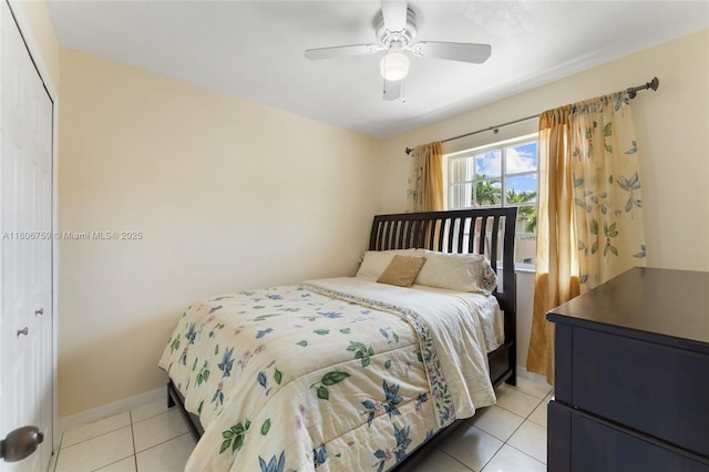 6755 NW 182nd St Unit 104, Hialeah, FL 33015 - bedroom with light tile patterned floors, a closet, ceiling fan, and baseboards