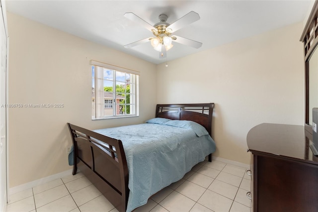 6755 NW 182nd St Unit 104, Hialeah, FL 33015 - bedroom featuring light tile patterned floors, baseboards, and ceiling fan