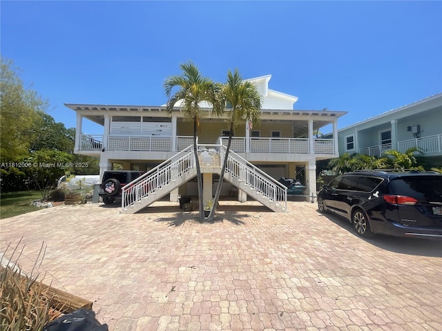 894 Ellen Dr, Key Largo, FL 33037 - view of front of property with stairway and covered porch