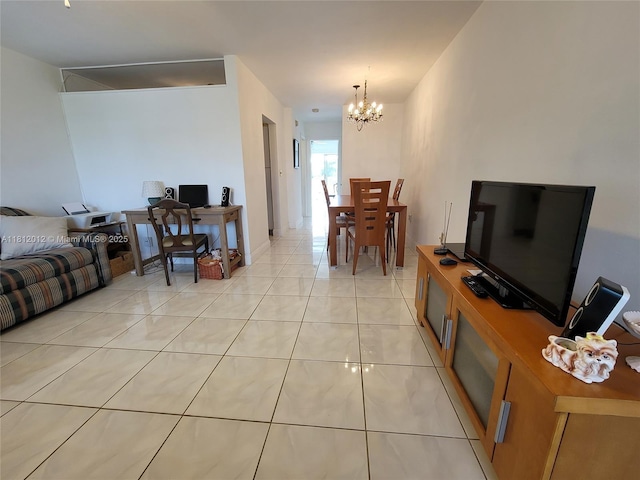 15600 NE 6th Ave Unit 33A, Miami, FL 33162 - living area with a chandelier, light tile patterned floors, and a desk