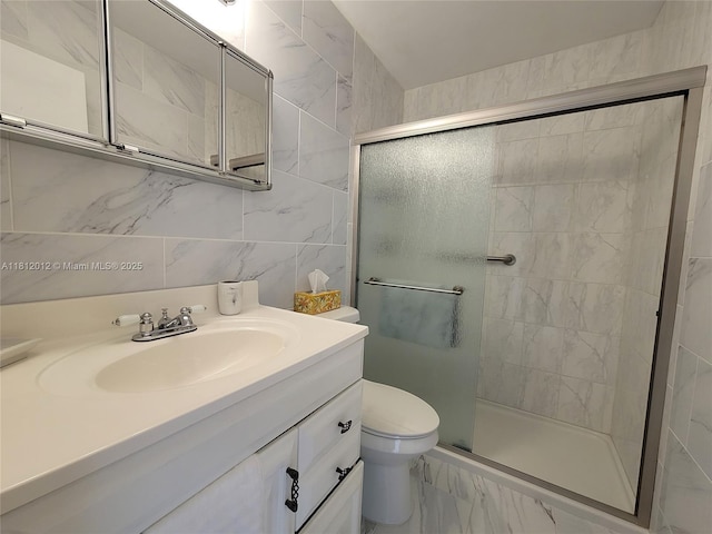 15600 NE 6th Ave Unit 33A, Miami, FL 33162 - bathroom featuring toilet, a stall shower, marble finish flooring, and vanity