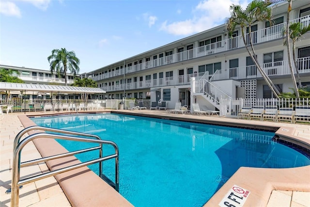 15600 NE 6th Ave Unit 33A, Miami, FL 33162 - community pool featuring a patio and stairway