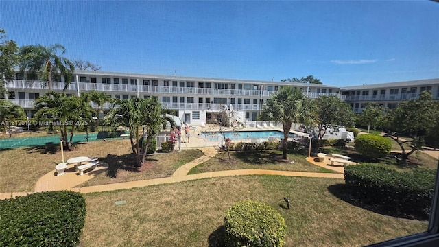15600 NE 6th Ave Unit 33A, Miami, FL 33162 - view of home's community with a yard and a pool