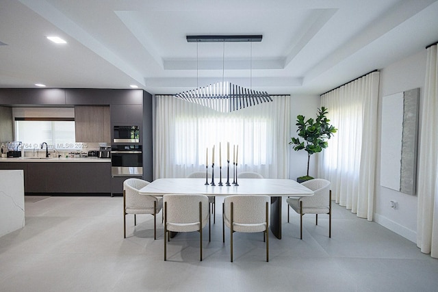 10506 SW 89th Pl, Miami, FL 33176 - dining space featuring a raised ceiling and healthy amount of natural light