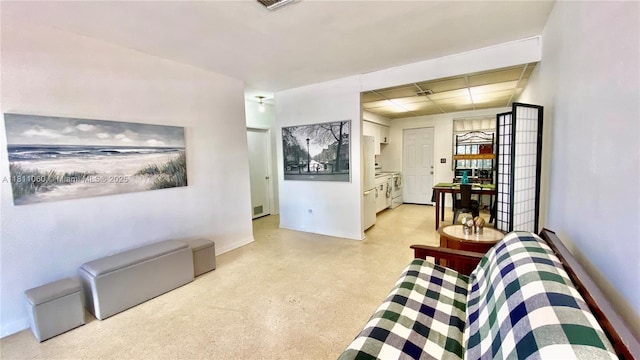 580 NE 139th St, North Miami, FL 33161 - living area with a drop ceiling and baseboards