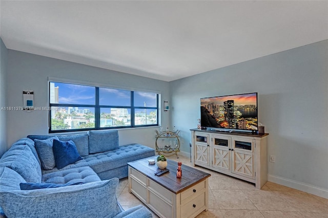 1201 S Ocean Dr Unit 312N, Hollywood, FL 33019 - living room with baseboards and light tile patterned floors
