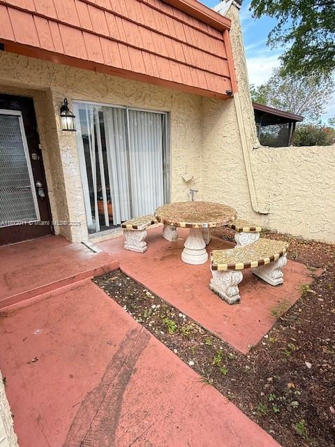 9423 NW 65th St Unit E2, Tamarac, FL 33321 - view of patio / terrace