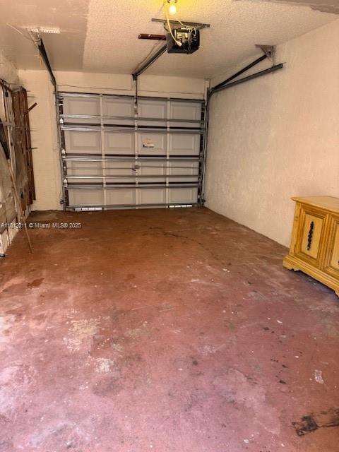 9423 NW 65th St Unit E2, Tamarac, FL 33321 - garage with a garage door opener