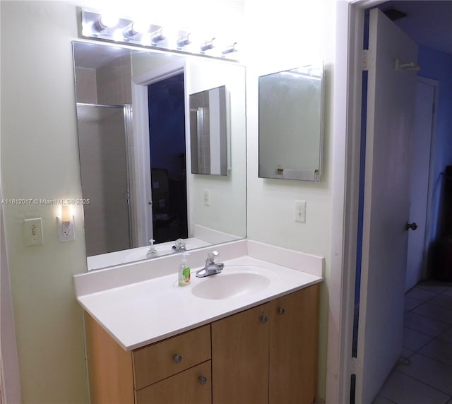 10823 SW 147th Ct, Miami, FL 33196 - bathroom with vanity, tile patterned flooring, and a shower with shower door