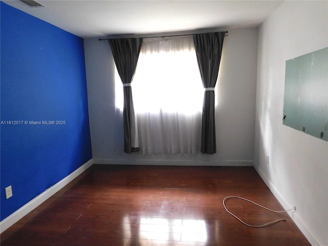 10823 SW 147th Ct, Miami, FL 33196 - empty room featuring wood finished floors and baseboards