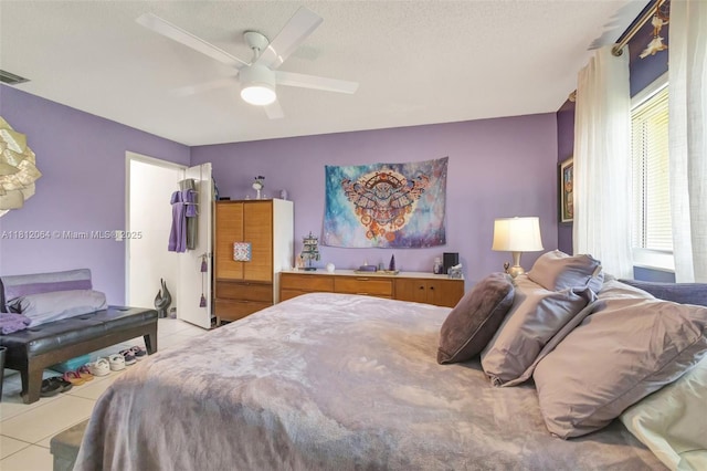 13097 Via Minerva, Delray Beach, FL 33484 - bedroom with tile patterned floors and ceiling fan