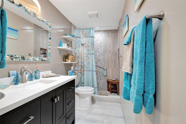 13097 Via Minerva, Delray Beach, FL 33484 - bathroom with vanity, a stall shower, and toilet