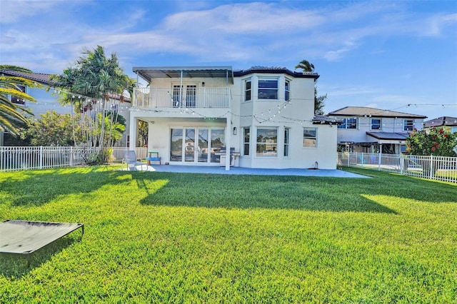 16880 SW 49th Ct, Miramar, FL 33027 - back of property featuring a balcony, a patio area, and stucco siding