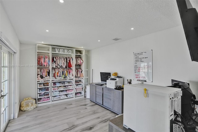 16880 SW 49th Ct, Miramar, FL 33027 - office area featuring light wood finished floors, recessed lighting, and a textured ceiling