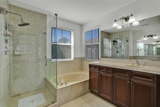 16880 SW 49th Ct, Miramar, FL 33027 - full bathroom featuring a shower stall, a garden tub, vanity, and healthy amount of natural light