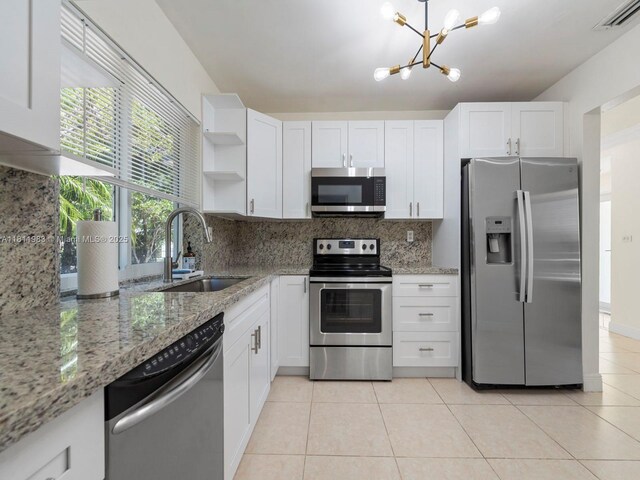 12531 SW 37th Ter, Miami, FL 33175 - unfurnished room featuring baseboards and light tile patterned flooring