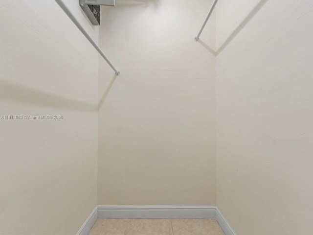 12531 SW 37th Ter, Miami, FL 33175 - walk in closet with light tile patterned floors
