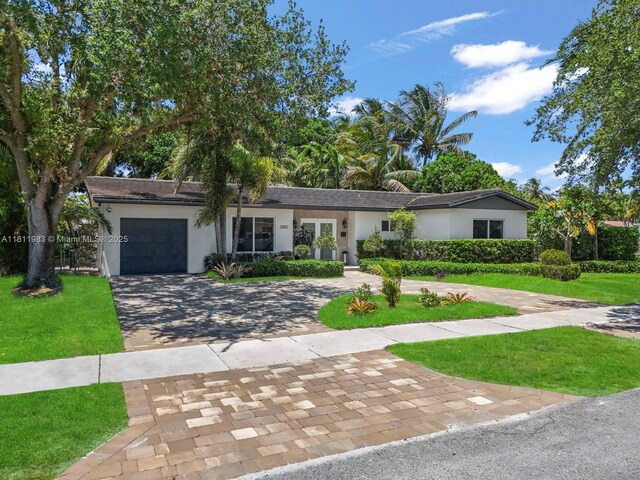 12531 SW 37th Ter, Miami, FL 33175 - doorway to property featuring french doors and stucco siding