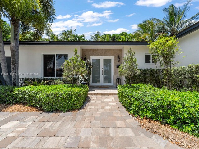 12531 SW 37th Ter, Miami, FL 33175 - entrance to property with french doors and stucco siding