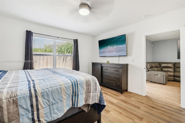 579 NE 6th Pl, Florida City, FL 33034 - bedroom featuring light wood finished floors, ceiling fan, and baseboards