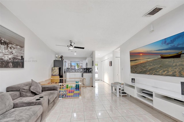 5651 SW 139th Pl, Miami, FL 33183 - living area featuring light tile patterned floors, ceiling fan, and recessed lighting