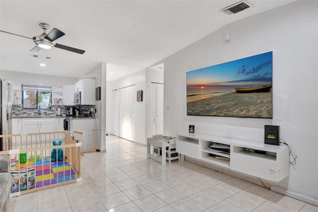 5651 SW 139th Pl, Miami, FL 33183 - living area featuring a ceiling fan, light tile patterned floors, and recessed lighting