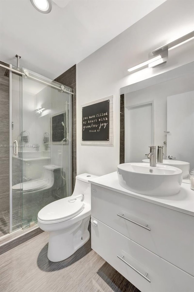 5651 SW 139th Pl, Miami, FL 33183 - full bath featuring vanity, toilet, and a stall shower