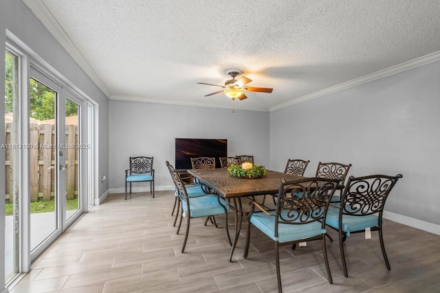 7251 SW 158th Pl, Miami, FL 33193 - dining space featuring a textured ceiling, a ceiling fan, ornamental molding, and light wood-style flooring