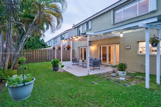 7251 SW 158th Pl, Miami, FL 33193 - rear view of house with stucco siding, french doors, a patio, and a pergola