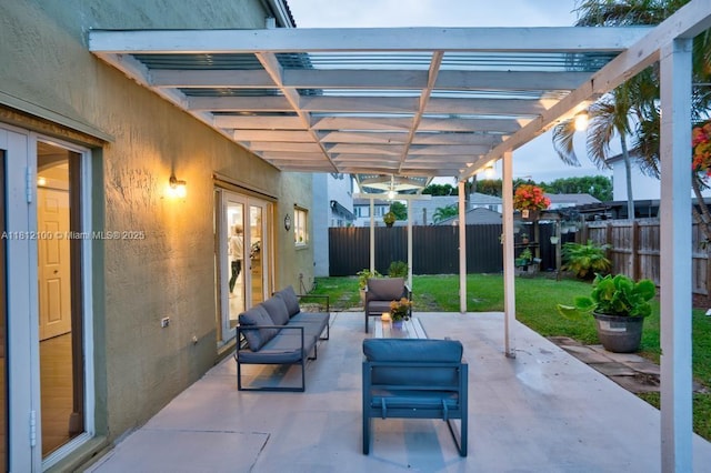 7251 SW 158th Pl, Miami, FL 33193 - fenced backyard featuring a pergola, a patio area, an outdoor living space, and french doors