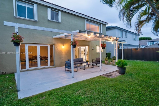 7251 SW 158th Pl, Miami, FL 33193 - back of house featuring a pergola, stucco siding, an outdoor hangout area, a patio area, and a tiled roof