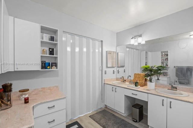 7251 SW 158th Pl, Miami, FL 33193 - bathroom with double vanity and wood finished floors