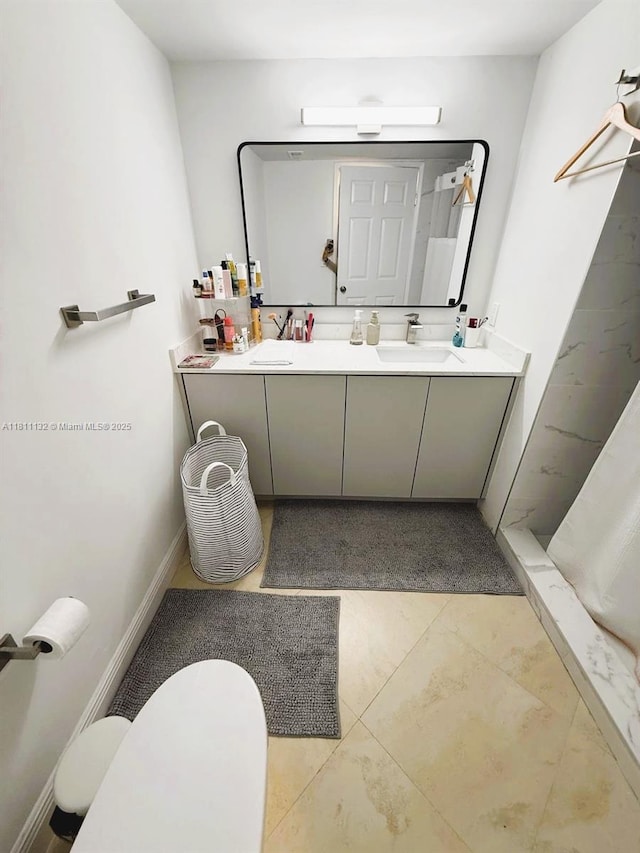 4730 NW 97th Ct Unit 76, Doral, FL 33178 - full bathroom with double vanity, tiled shower, and toilet